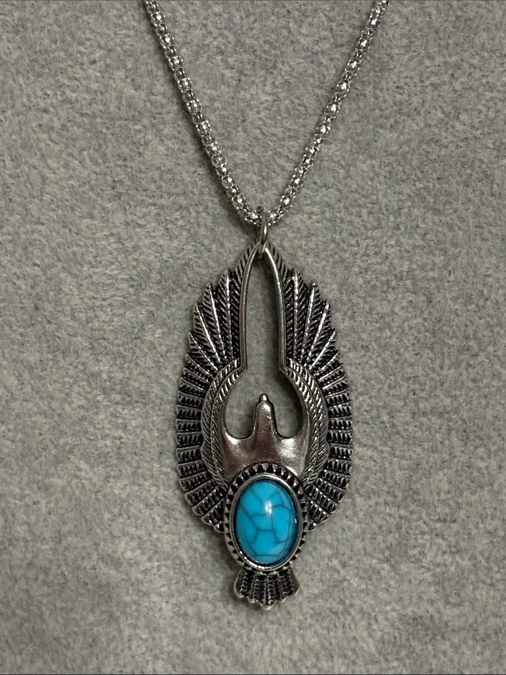 Silver Winged Pendant with Turquoise Stone